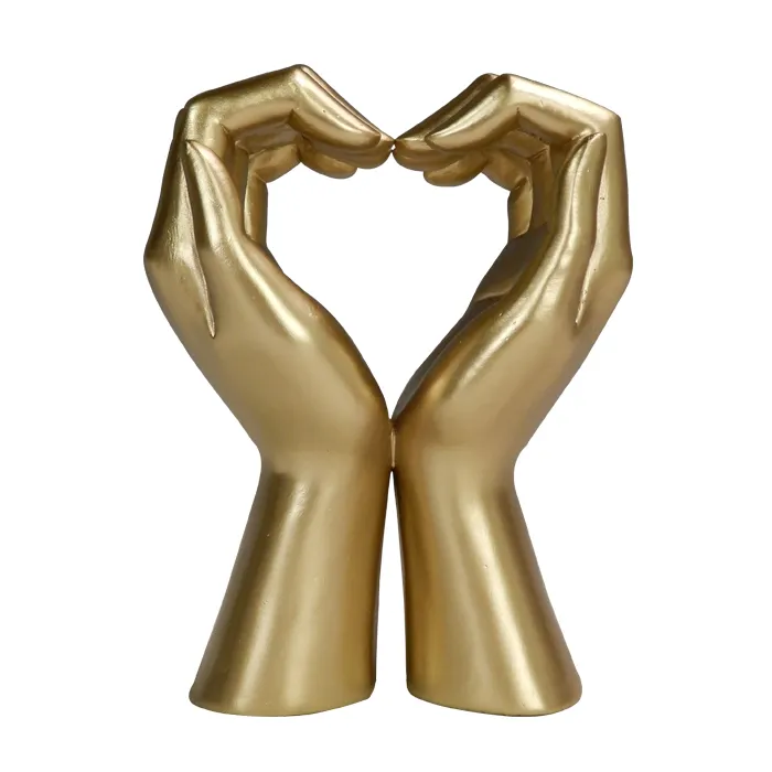 Złota figurka dekoracyjna glamour Serce z dłoni 44190FJ